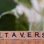 A close up of a block that says metaverse on it