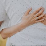 a person holding the hands together